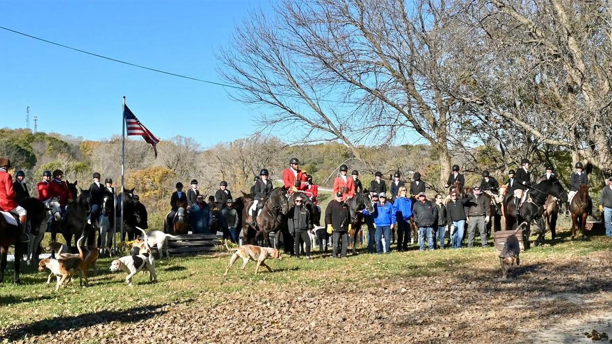 North Hills Hunt fox hunters line up in formal attire before opening hunt.